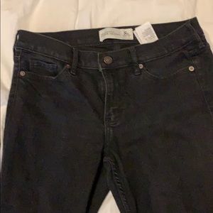 Faded black skinny jeans